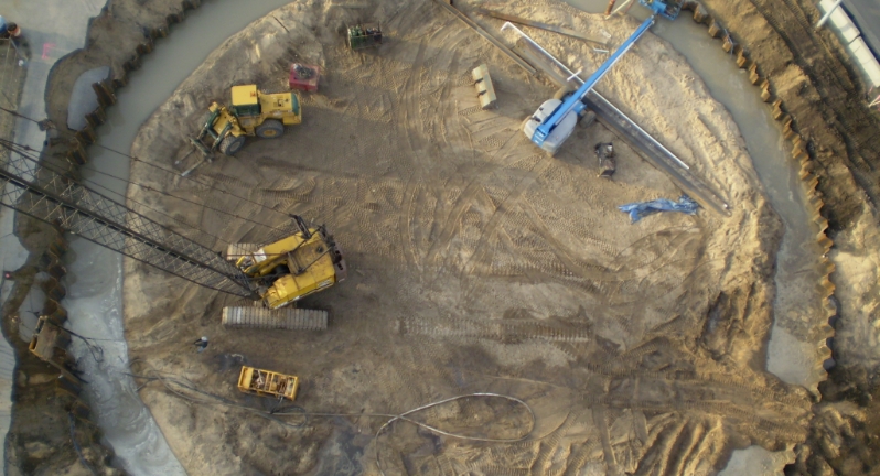An image of an aerial shot of a construction site with heavy equipment